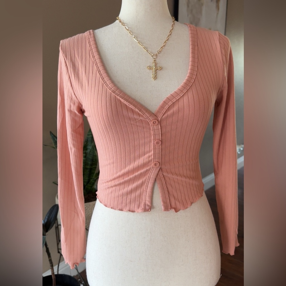 Crop long sleeve split front top in soft peach